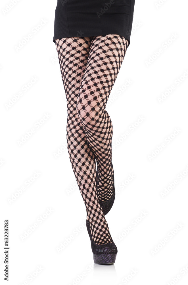 Woman in fishnet stockings isolated on white Woman in fishnet stockings isolated on white