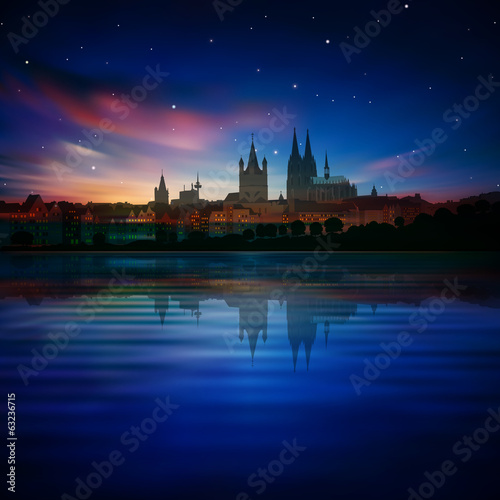 abstract background with silhouette of Cologne and sunset