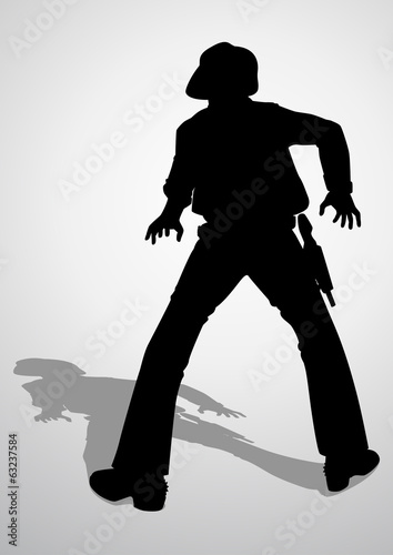 Silhouette illustration of a cowboy ready to draw a gun