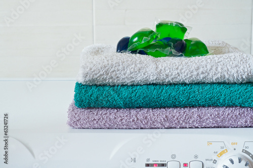 Capsule detergent on top of washing machine
