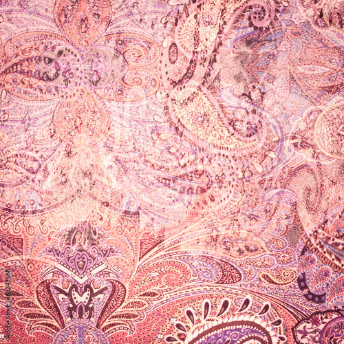 Vintage faded paisley fabric texture/background