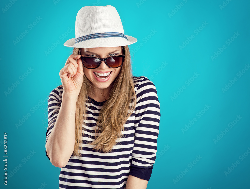 Pretty laughing woman tourist ready for summer adventure Pretty laughing woman tourist ready for summer adventure