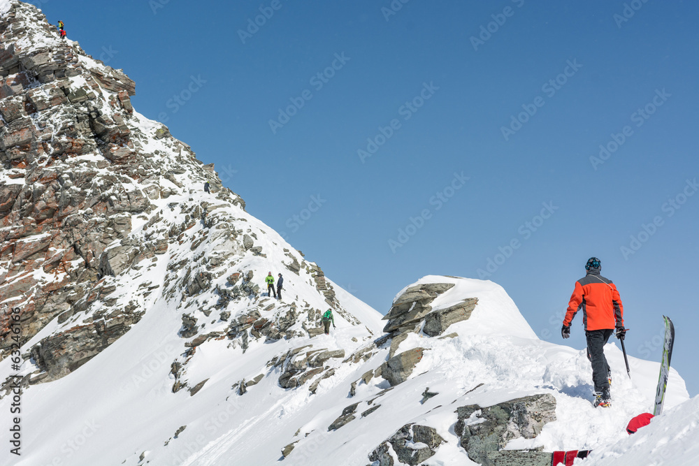 Person ascendind a mountain