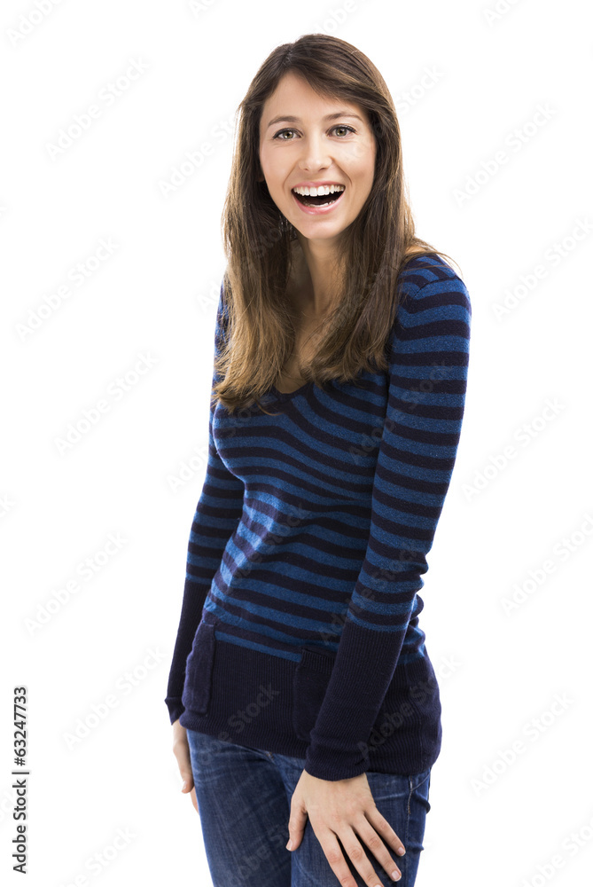 Beautiful and happy woman smiling over a white background
