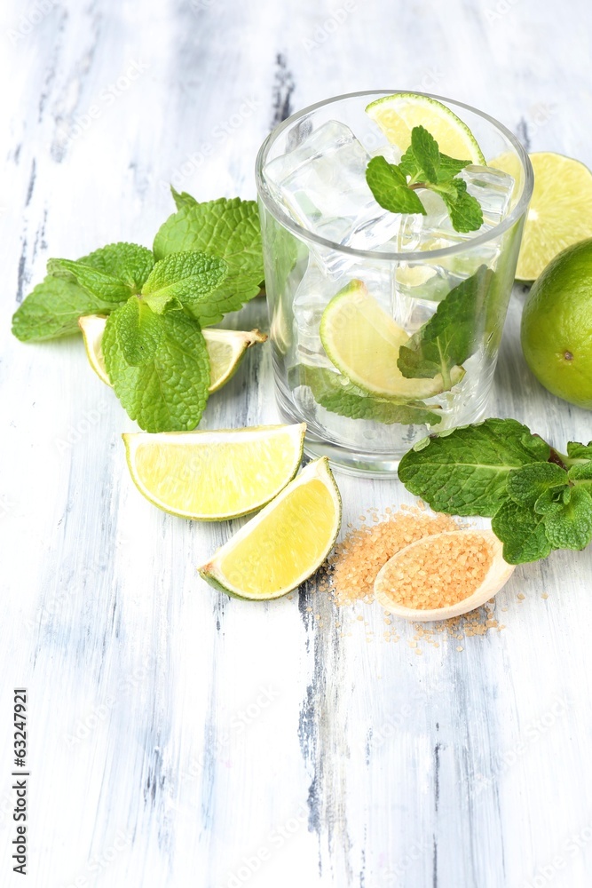 Fototapeta premium Ingredients for lemonade on wooden table