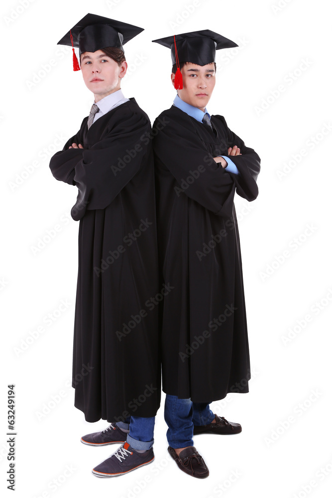 Two happy graduating students isolated on white Two happy graduating students isolated on white