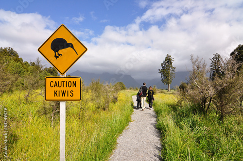 Caution kiwi panel on a trail - New Zealand