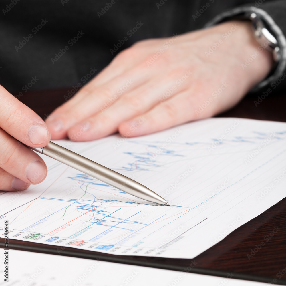 Business men reading contract - 1 to 1 ratio Business men reading contract - 1 to 1 ratio