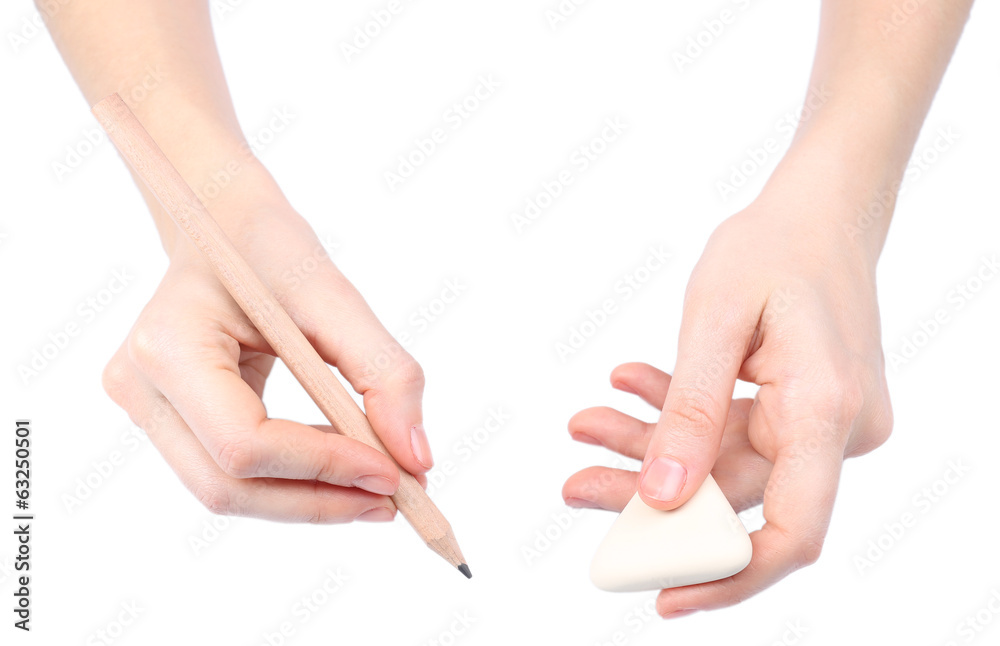 Human hands with pencil and erase rubber, isolated on white Human hands with pencil and erase rubber, isolated on white