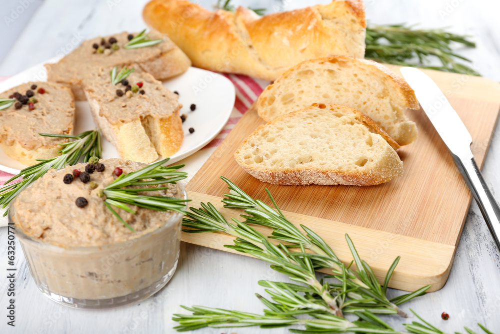 Fresh pate with bread on wooden table Fresh pate with bread on wooden table