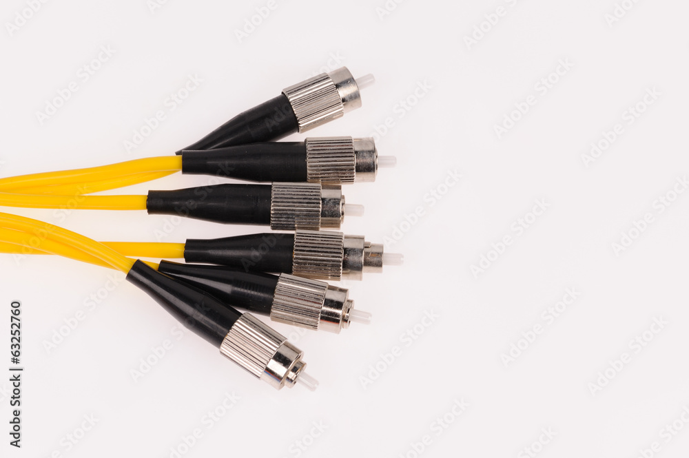 Fiber optic cables isolated on grey background Fiber optic cables isolated on grey background