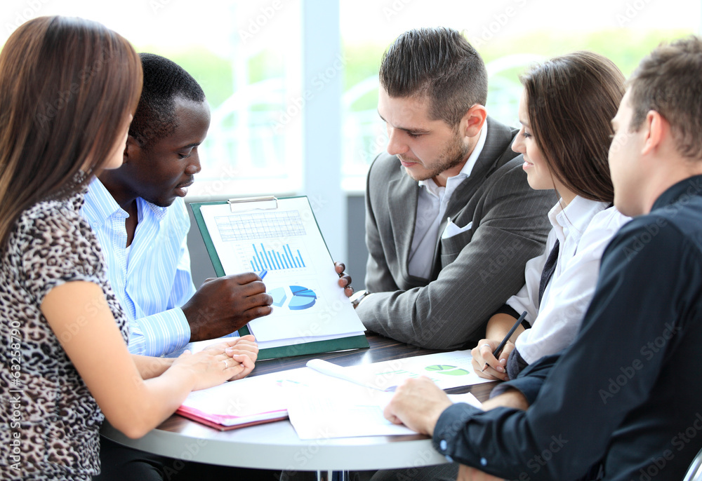 Fototapeta premium business partners discussing documents and ideas at meeting