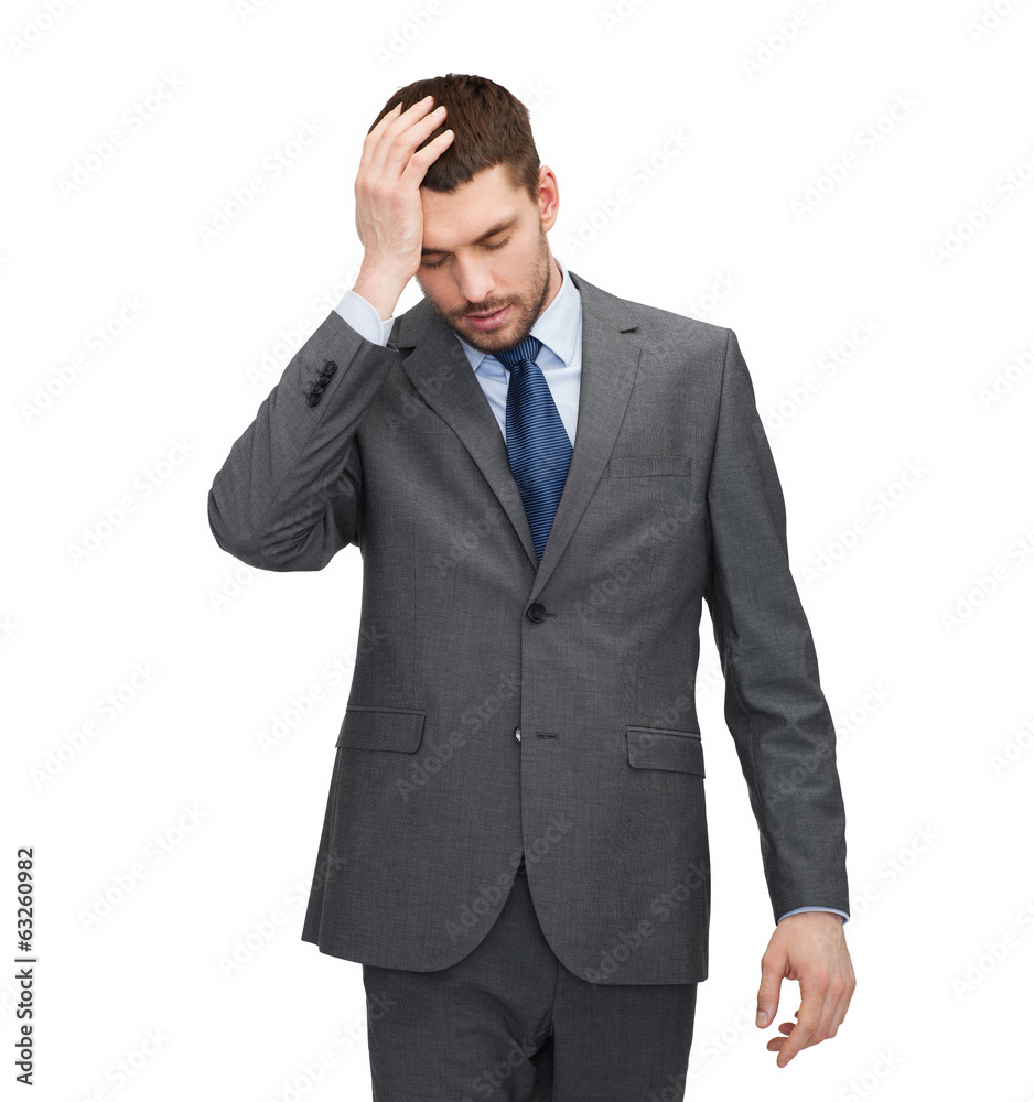 handsome businessman having headache handsome businessman having headache
