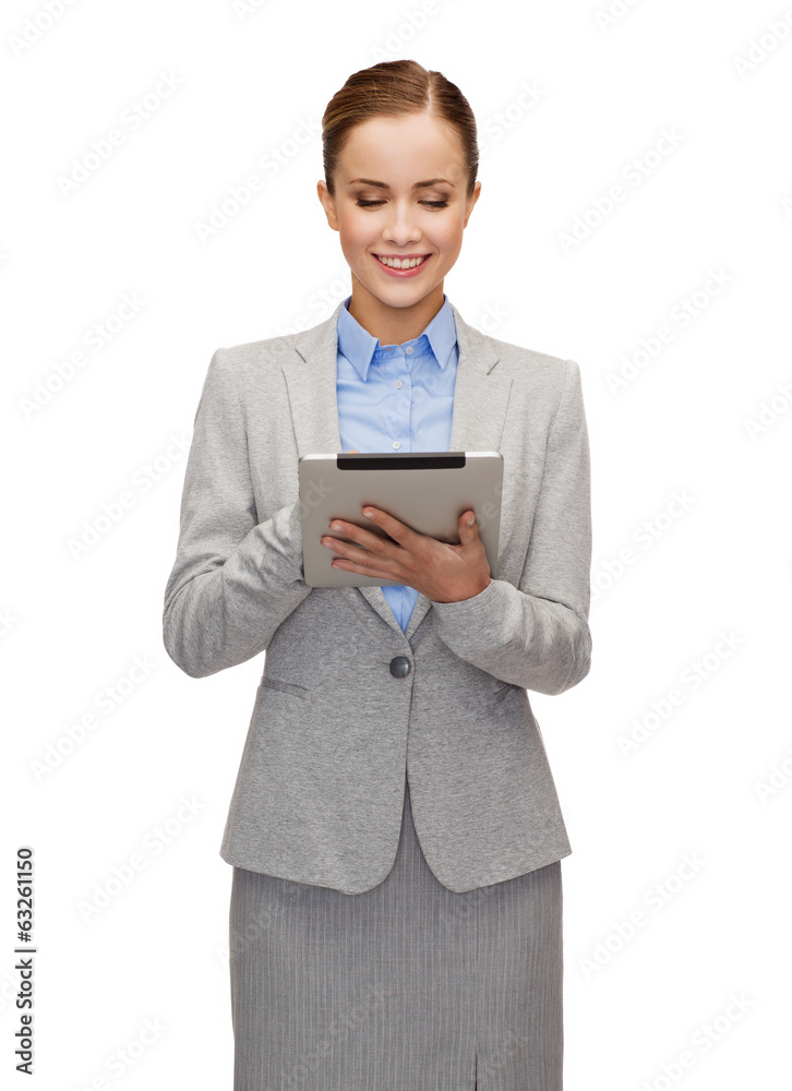 smiling woman looking at tablet pc computer smiling woman looking at tablet pc computer