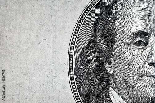 Dollars closeup..Detail of a Benjamin Franklin's portrait