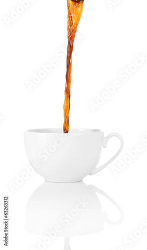 Pour coffee into cup, isolated on white