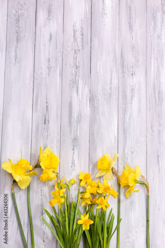 Fototapeta Naklejka Na Ścianę i Meble -  Beautiful flowers on color wooden background