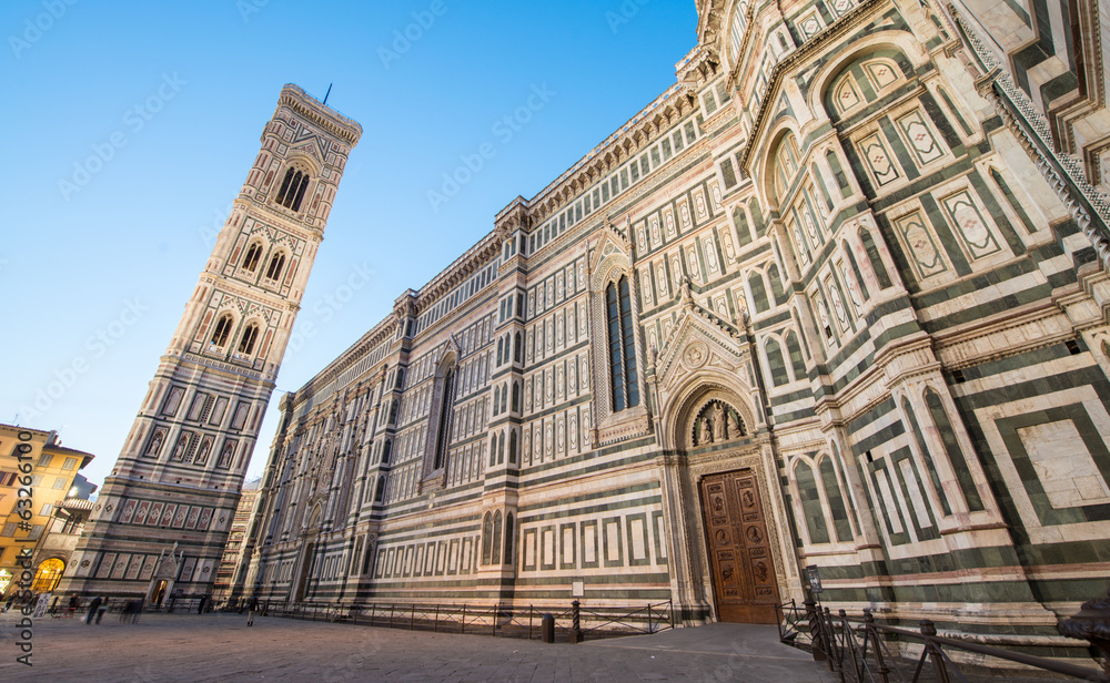 Facade of Duomo in Florence, city architecture at dusk