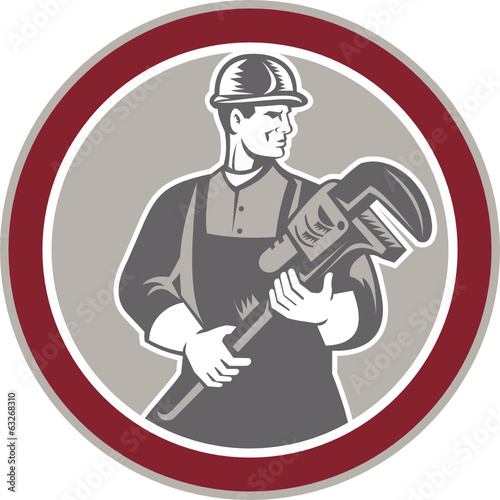 Plumber Holding Giant Wrench Woodcut Circle