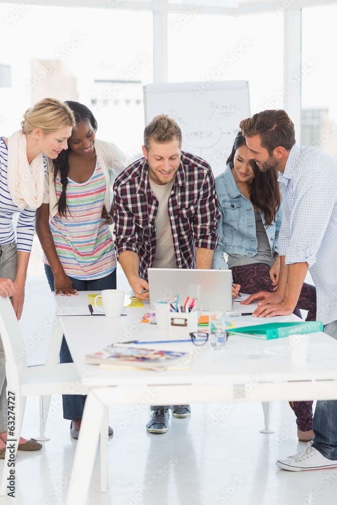 Happy team of designers having a meeting Happy team of designers having a meeting