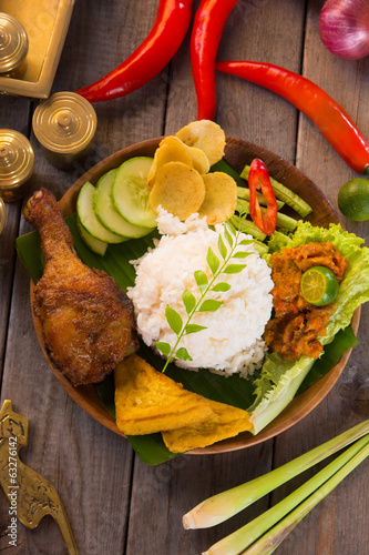 nasi ayam penyet, indonesian fried chicken rice photo