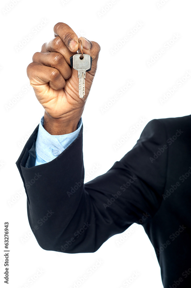 Fototapeta premium Guy showing car key, cropped image.