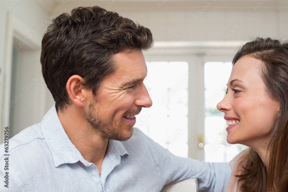Loving young couple looking at each other Loving young couple looking at each other