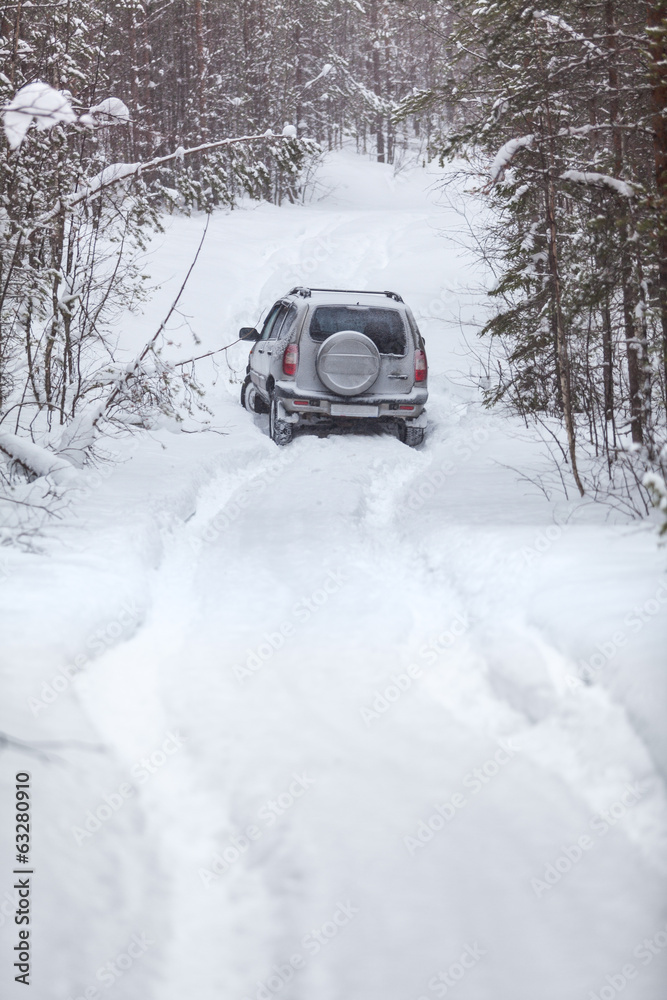 Offroad riding with deep trucks in snowy road Offroad riding with deep trucks in snowy road