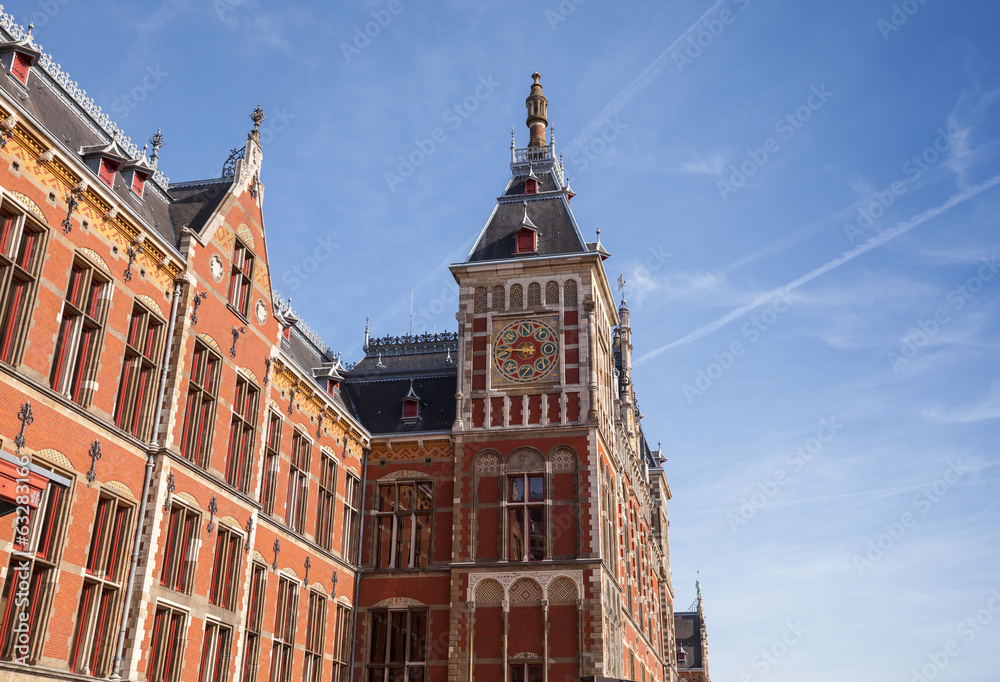 Old building facade of central railroad station in Amsterdam