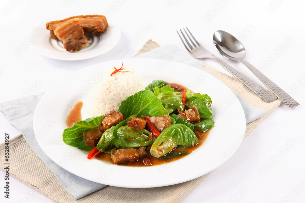 Stir fried kale with crispy pork - chinese food Stir fried kale with crispy pork - chinese food