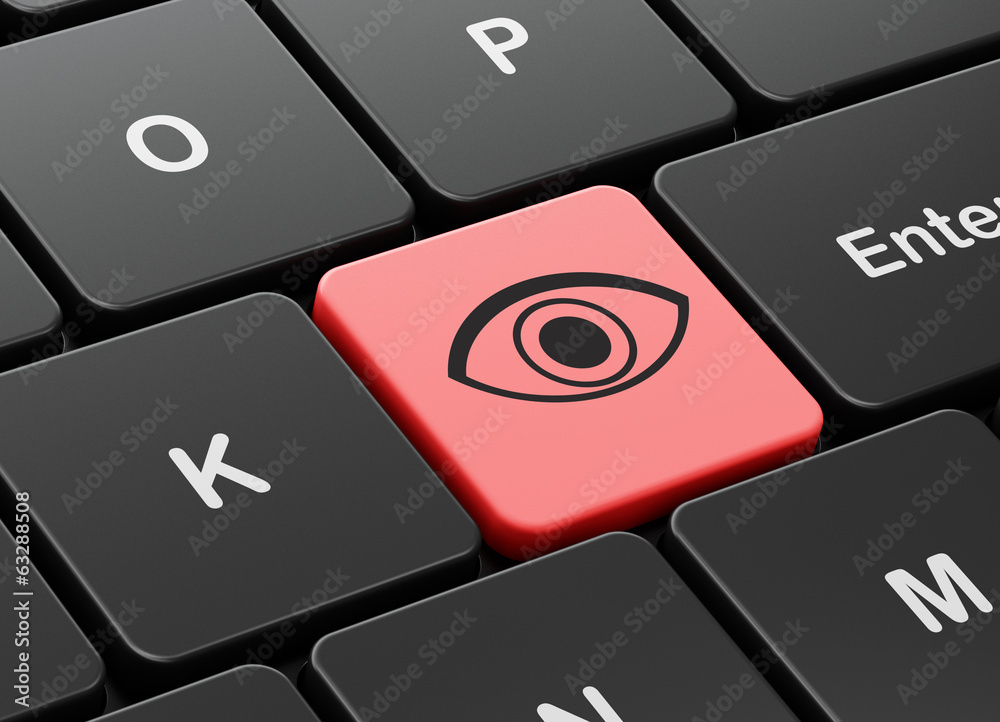 Protection concept: Eye on computer keyboard background Protection concept: Eye on computer keyboard background