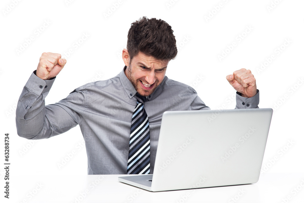 Angry man having problem with his laptop Angry man having problem with his laptop