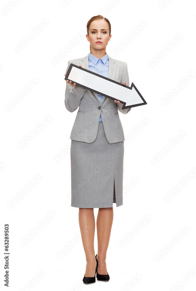 serious businesswoman with direction arrow sign serious businesswoman with direction arrow sign