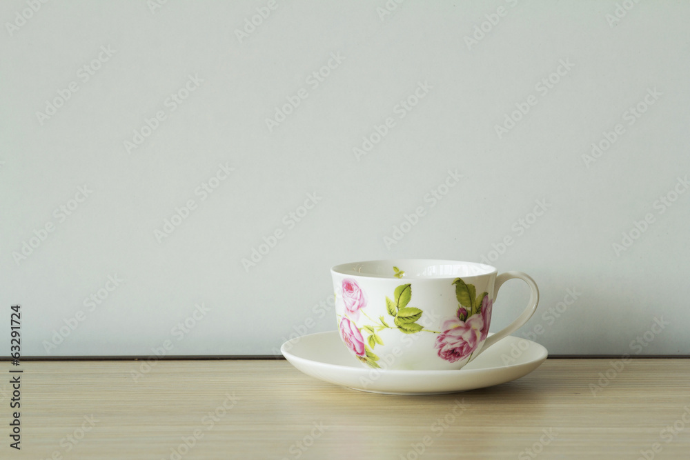 Fototapeta premium Mug/cup on wood table and white background