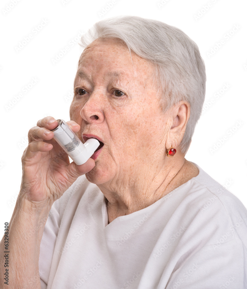 Senior woman with asthma inhaler