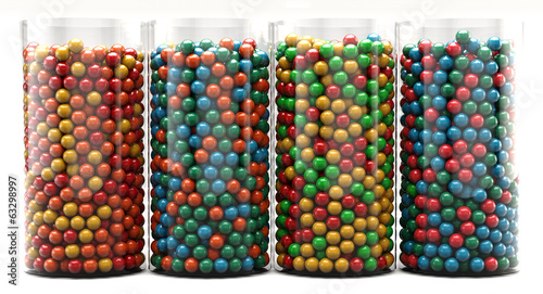 A colourful background of assorted candy in glass