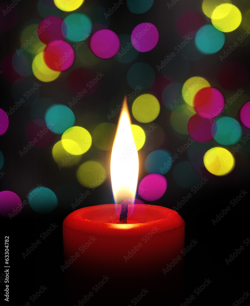 candle flame at night with bokeh candle flame at night with bokeh