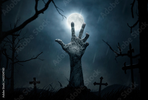 Fototapeta Halloween, dead hand coming out from the soil