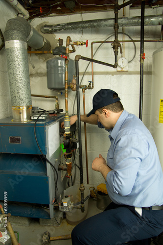 Plumber repairs furnace 