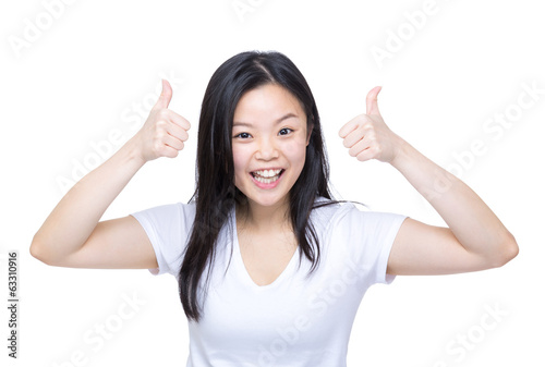 Excited asia woman thumb up