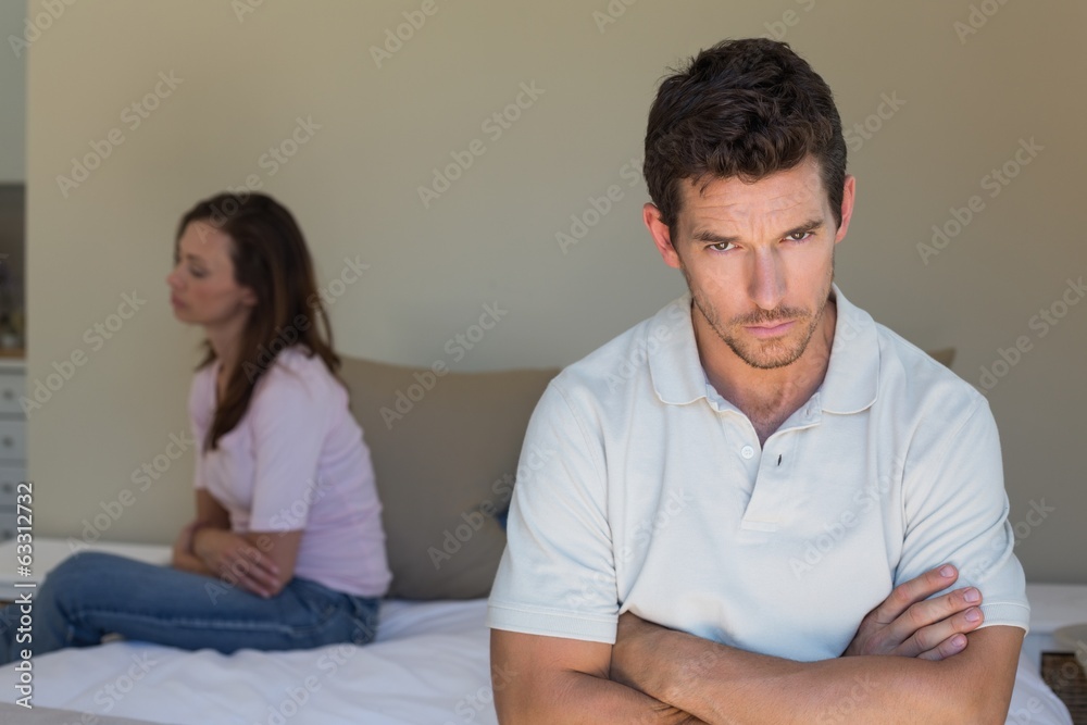 Couple not talking after an argument in bed Couple not talking after an argument in bed