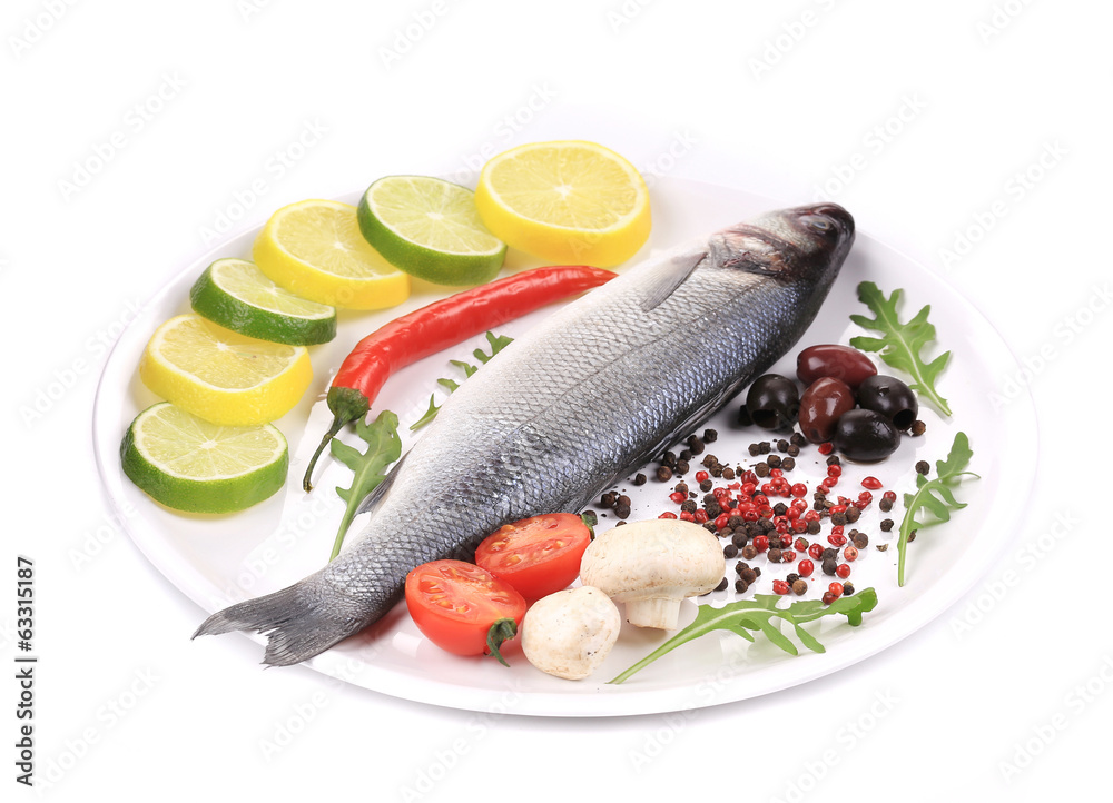Seabass on plate with citrus and pepper