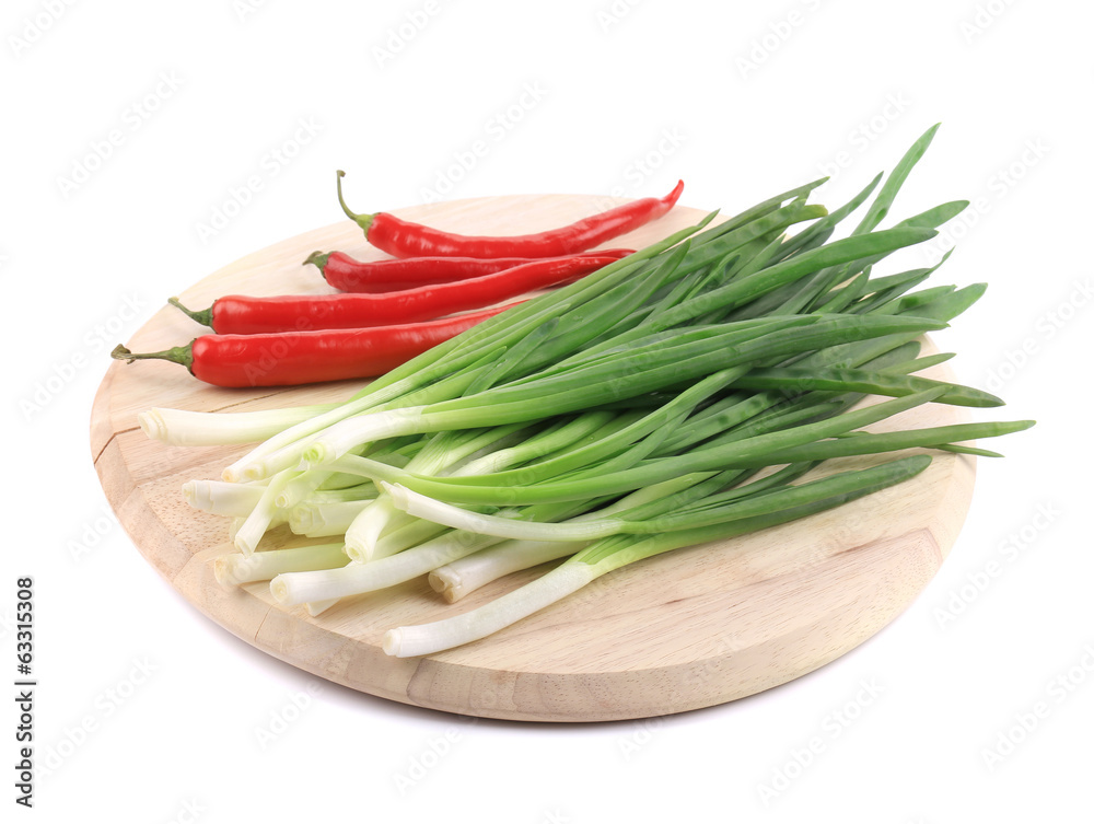 Bunch of green onion with red pepper Bunch of green onion with red pepper