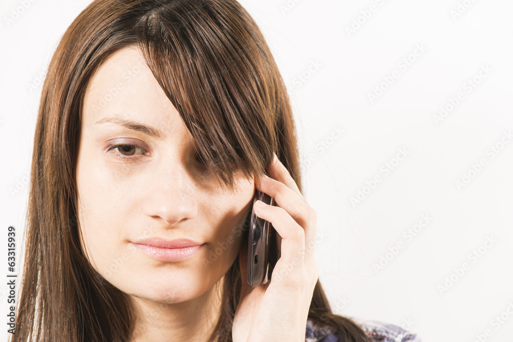 Young women talking on the phone Young women talking on the phone