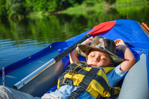 Boy kayaking photo