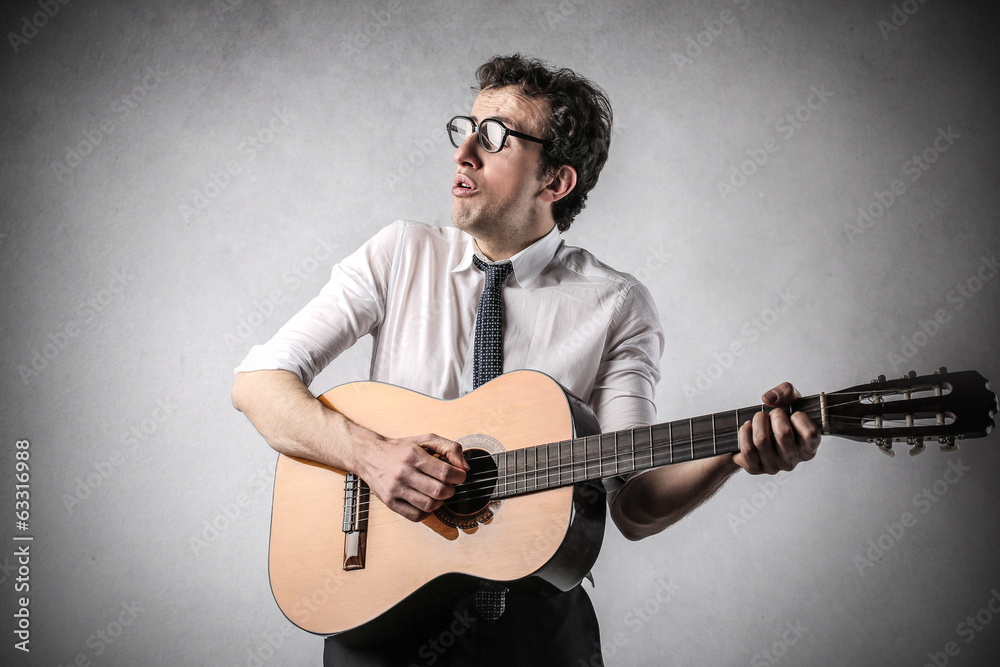 Fototapeta premium businessman with guitar