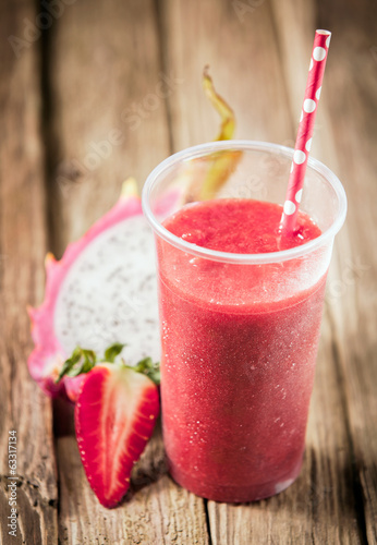 Tropical smoothie with strawberriyand dragon fruit