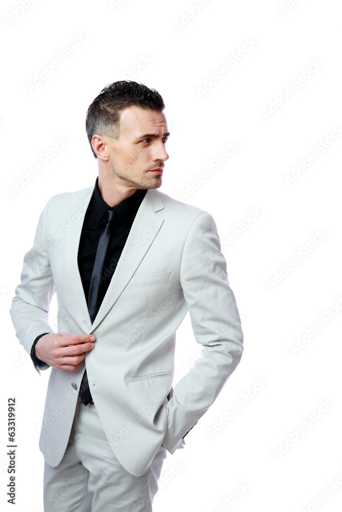 Portrait of a handsome businessman looking away 