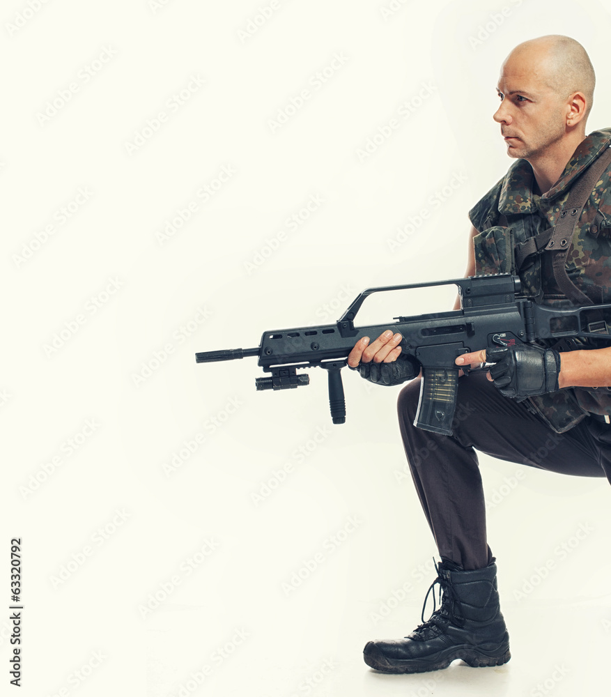 Portrait of soldier posing on white background Portrait of soldier posing on white background