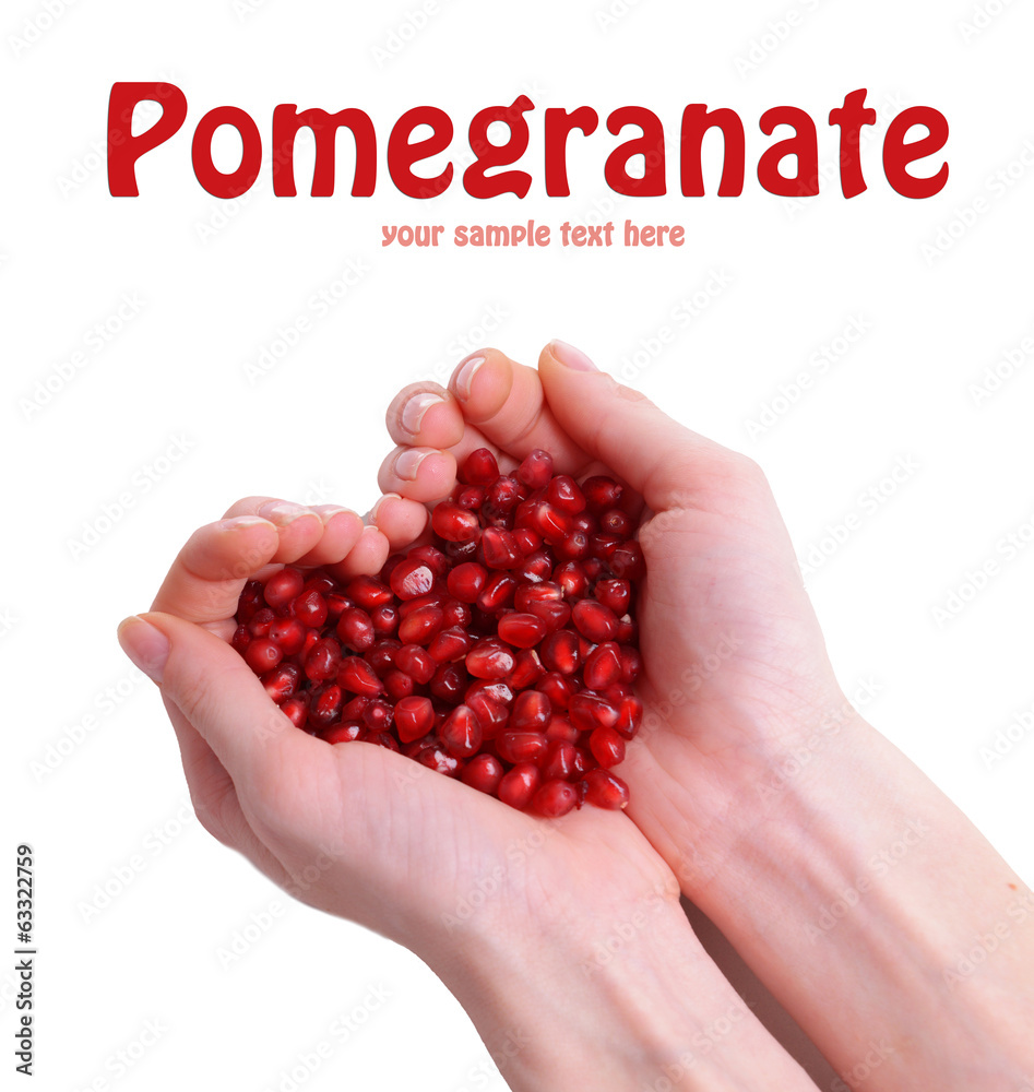 Ripe pomegranate in hands isolated on white Ripe pomegranate in hands isolated on white